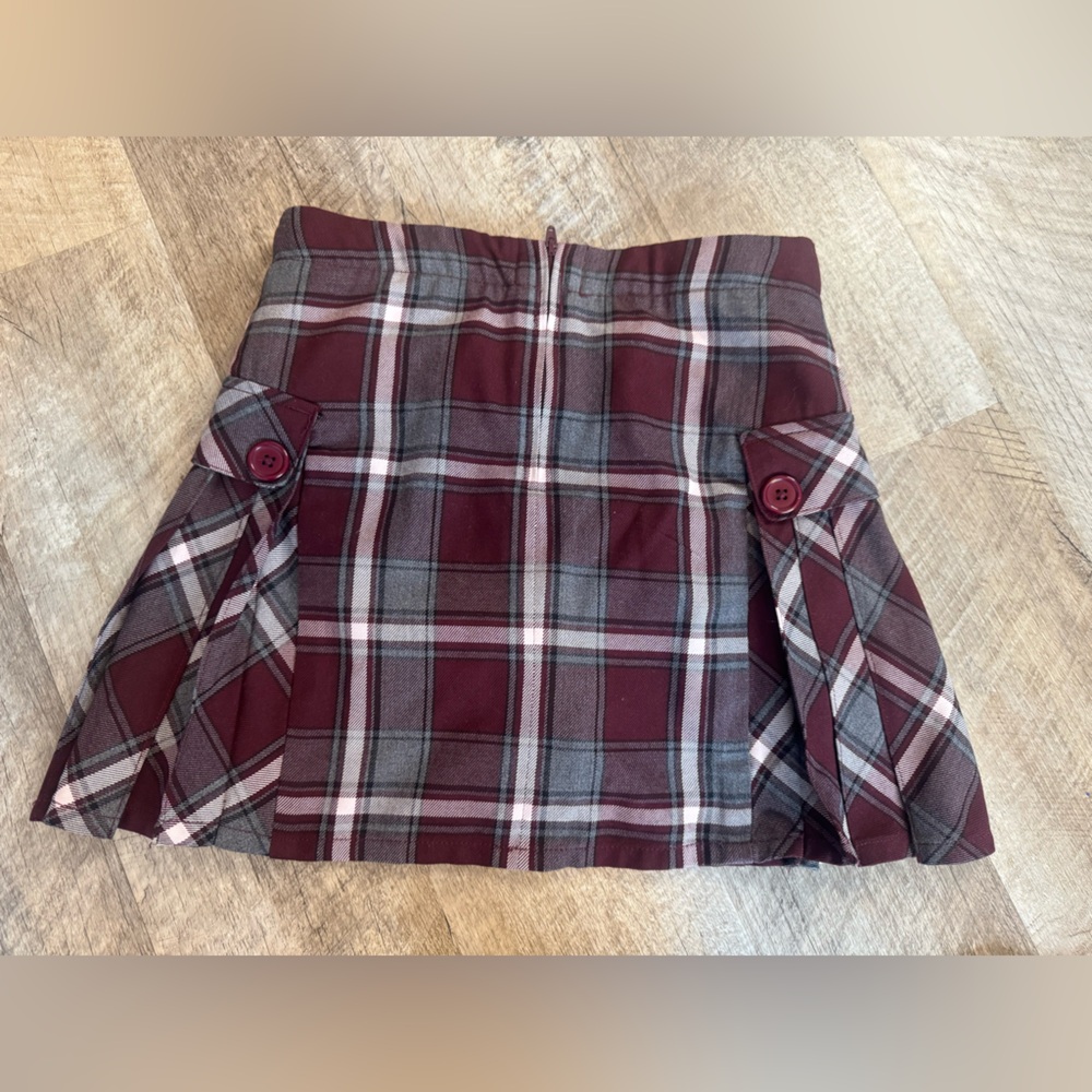 Lands End size 10 plaid skirt, elastic button adjustable waist/side pockets